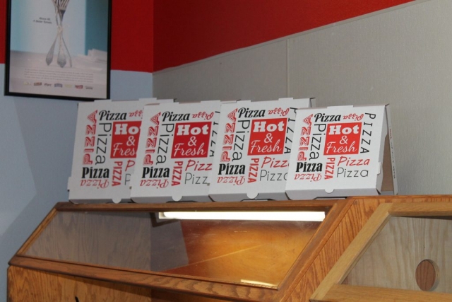 Pizza Plus in Escalon's pizza in four sizes